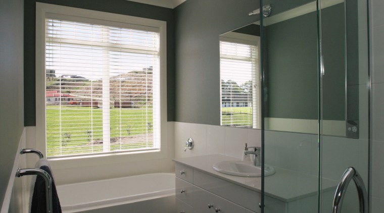 A view of the bathroom, dark grey walls, bathroom, bathroom accessory, bathroom cabinet, home, interior design, real estate, room, window, window covering, window treatment, gray, black