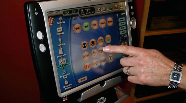 view of the crestron wireless touchscreen that can display device, electronic device, electronics, gadget, mobile device, multimedia, screen, tablet computer, technology, black, red