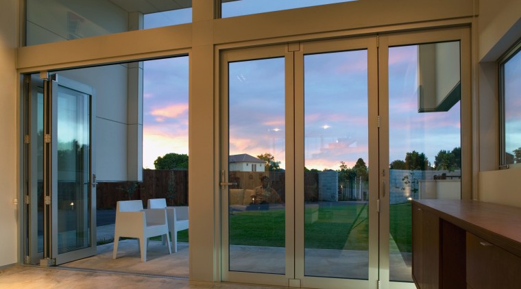 view of these bifold doors that open out door, glass, interior design, real estate, window, brown