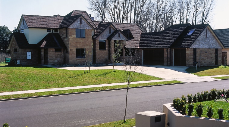 view of the supreme winner in the gerard architecture, asphalt, cottage, estate, facade, farmhouse, grass, home, house, land lot, landscape, landscaping, lawn, neighbourhood, property, real estate, residential area, roof, siding, suburb, tree, walkway, yard, white, black
