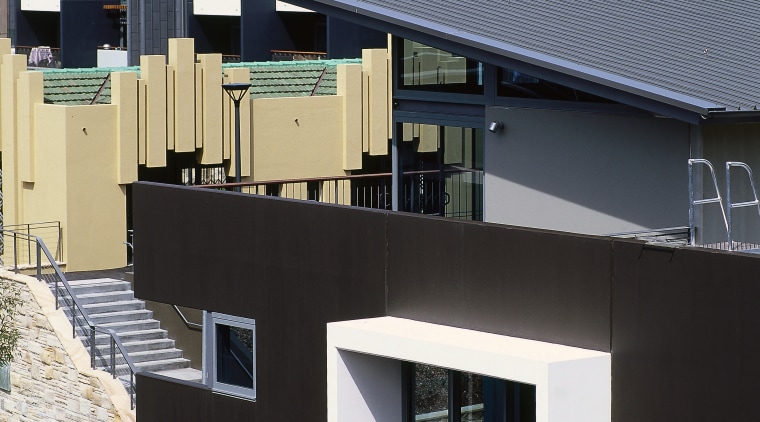 A view of the roofing used through out architecture, building, commercial building, elevation, facade, house, metropolitan area, real estate, residential area, roof, black, gray