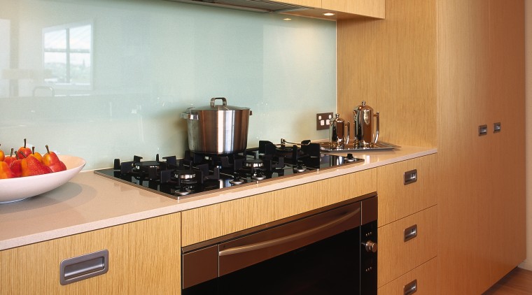 A view of a kitchen, wooden cabinetry and cabinetry, countertop, cuisine classique, interior design, kitchen, room, orange, brown