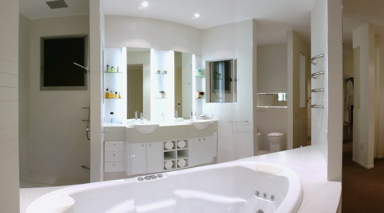 view of this bathroom featuring recessed jet spa bathroom, bathroom accessory, bathroom cabinet, estate, home, interior design, property, real estate, room, gray, white