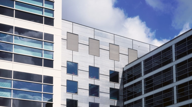 view of the new head office Of DIMA apartment, architecture, building, commercial building, condominium, corporate headquarters, daytime, facade, headquarters, line, metropolis, metropolitan area, mixed use, residential area, sky, skyscraper, tower block, urban area, window, white
