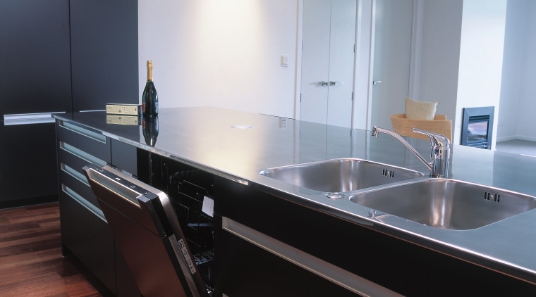 Kitchen with dark coloured cabinetry, stainless steel benchtop cabinetry, countertop, floor, glass, interior design, kitchen, sink, gray, black