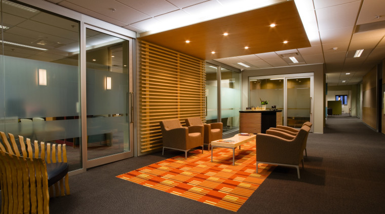 A view of the reception area in an ceiling, conference hall, floor, flooring, interior design, lobby, office, brown