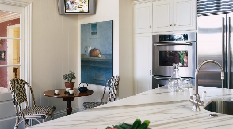 view of this white kitchen featuring white painted countertop, home, interior design, kitchen, living room, room, window, gray