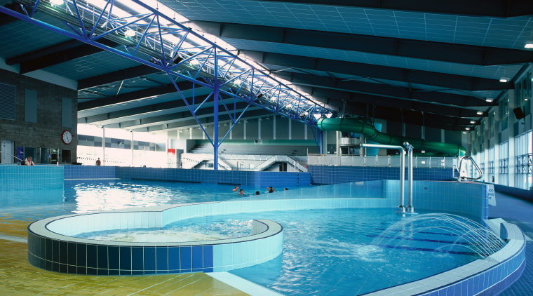 Large indoor pool complex with steel girders across leisure, leisure centre, resort town, sport venue, swimming pool, thermae, water, water park, teal