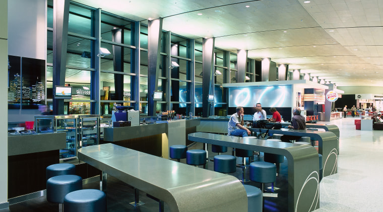 View of bar area in food court with interior design, gray