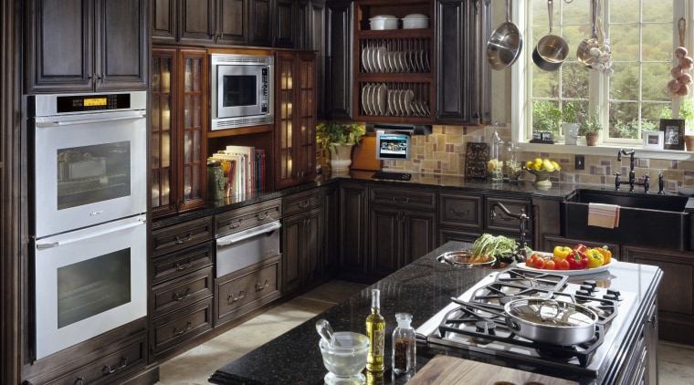 Traditional style kitchen with dark cabinetry, and matte cabinetry, countertop, cuisine classique, home appliance, interior design, kitchen, kitchen appliance, room, black, gray