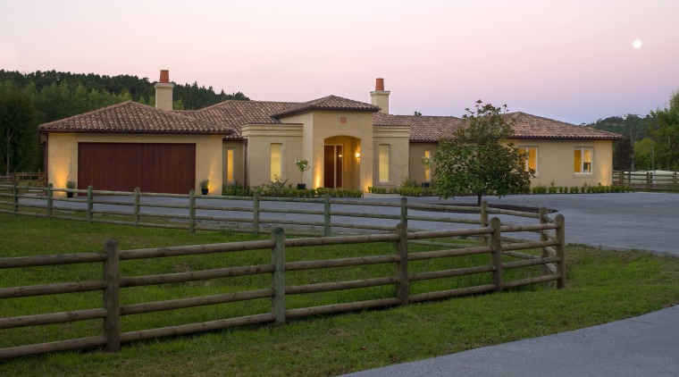 Rural home with traditional European theme. - Rural cottage, estate, facade, farm, farmhouse, fence, home, house, land lot, landscape, property, real estate, residential area, rural area, sky, brown, white