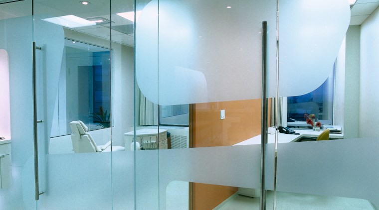 A close up view of the glass screens. ceiling, glass, interior design, product design, wall, teal, gray