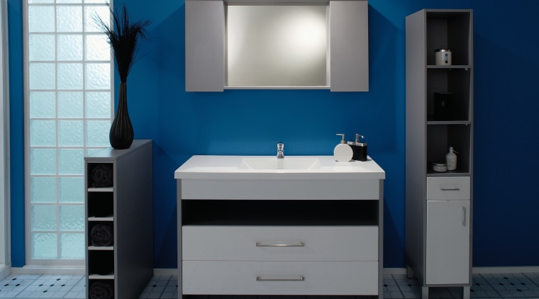 A view of a bathrom designed by Vogue bathroom, bathroom accessory, bathroom cabinet, product, product design, room, sink, blue, gray