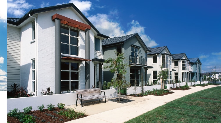 Row of new two-storey homes in residential development, cottage, elevation, estate, facade, home, house, mansion, neighbourhood, property, real estate, residential area, siding, sky, suburb, villa, window, blue