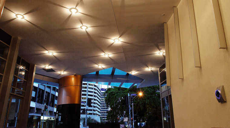 Lobby providing grand entrance to apartment building, and architecture, ceiling, daylighting, interior design, light, lighting, lobby, brown