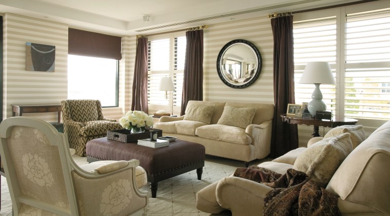 view of the living room featuring white cream furniture, home, interior design, living room, room, window, window covering, window treatment, white, brown