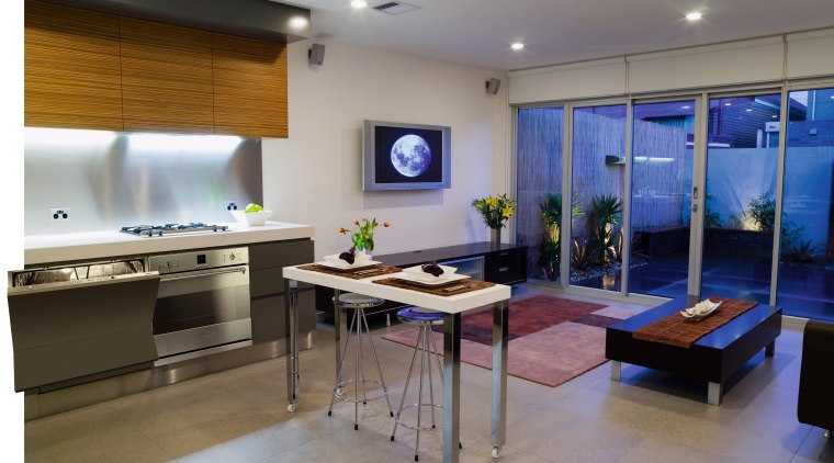 View of kitchen with stainless steel appliances, small countertop, floor, interior design, kitchen, real estate, room, table, gray