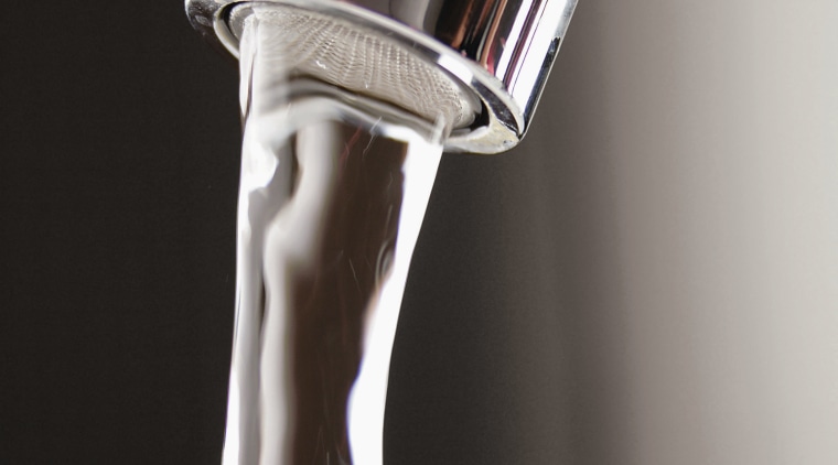 A view of a hot water cylinder from arm, product design, tap, water, black, gray