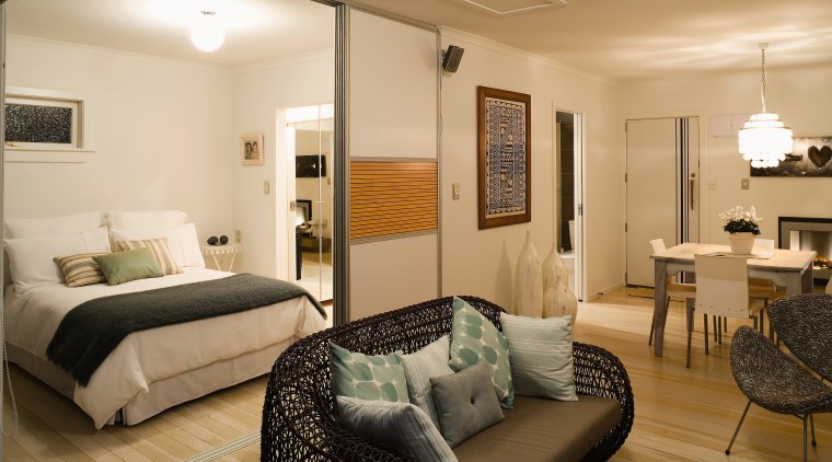 A view of a bach renovated by YellowFox. ceiling, home, interior design, living room, real estate, room, suite, orange