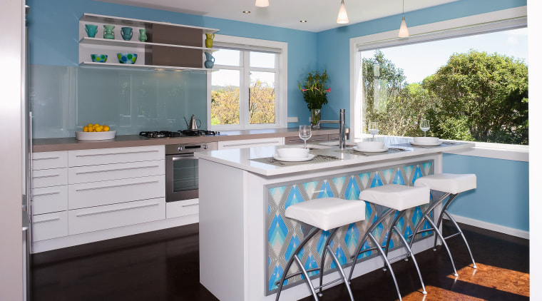 view of the kitchen featuring blum kitchen cabinetry, countertop, dining room, home, interior design, kitchen, real estate, room, gray, white