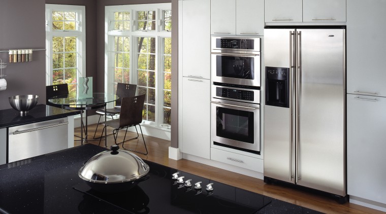 A view of some kitchen appliances by JenAir. cabinetry, countertop, cuisine classique, home appliance, interior design, kitchen, kitchen appliance, kitchen stove, major appliance, refrigerator, small appliance, black, gray, white