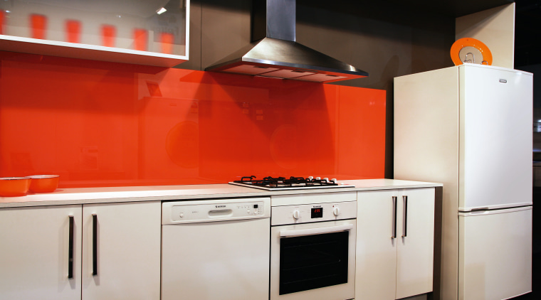 A view of some Simpson kitchen appliances. - cabinetry, countertop, home appliance, interior design, kitchen, kitchen appliance, kitchen stove, major appliance, orange, product, product design, room, gray