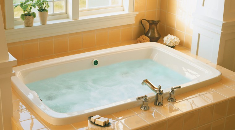 View of recessed white bath with yellow tiled bathroom, bathroom sink, bathtub, floor, jacuzzi, plumbing fixture, room, sink, white, orange