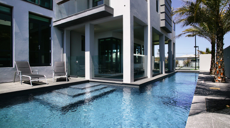 View of an L-shaped lap pool by Pool architecture, building, condominium, estate, home, house, property, real estate, swimming pool, villa, water, black