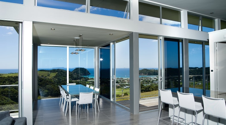 View of the living areas in this matapouri condominium, daylighting, door, house, interior design, real estate, window, white, gray