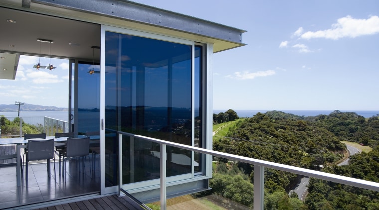 View of the living areas in this matapouri cottage, home, house, property, real estate, sky, window, teal