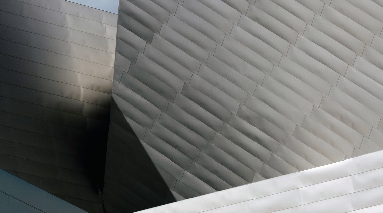 A view of Devers new Cultural Centre witch angle, architecture, building, cloud, daylighting, daytime, facade, house, line, roof, sky, structure, wall, window, wood, gray, black
