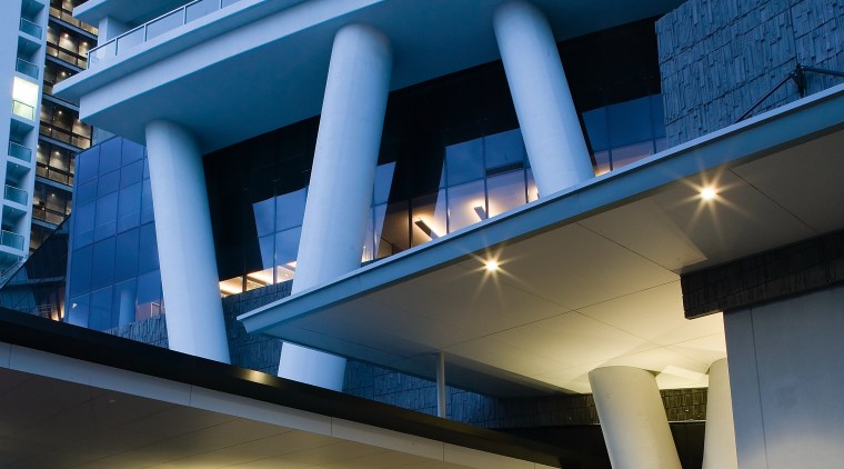 View of the steel columns that slice through apartment, architecture, building, commercial building, condominium, corporate headquarters, daytime, facade, headquarters, hotel, metropolitan area, mixed use, real estate, sky, skyscraper, blue