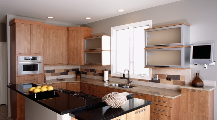 A view of this kitchen featuring granite countertops, cabinetry, countertop, cuisine classique, interior design, kitchen, room, white