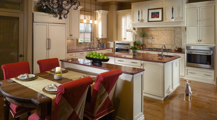 A view of this kitchen designed by Mcfarlane cabinetry, countertop, cuisine classique, dining room, floor, flooring, hardwood, interior design, kitchen, room, wood flooring, brown