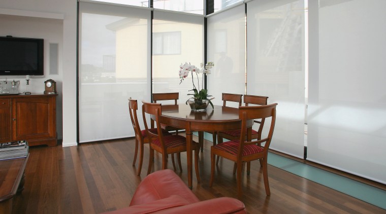 A view of some blnds and shutters from apartment, interior design, real estate, room, gray, brown