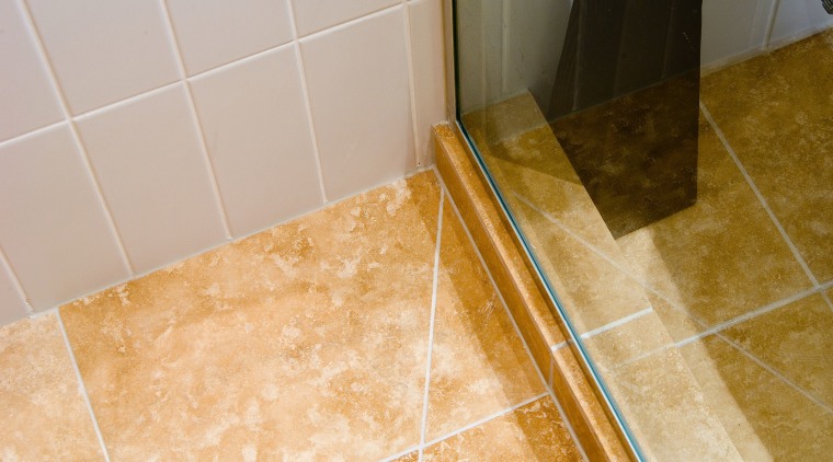 A view of some bathroomware from Newline Bathroomware. bathroom, floor, flooring, hardwood, room, tile, wall, orange, gray