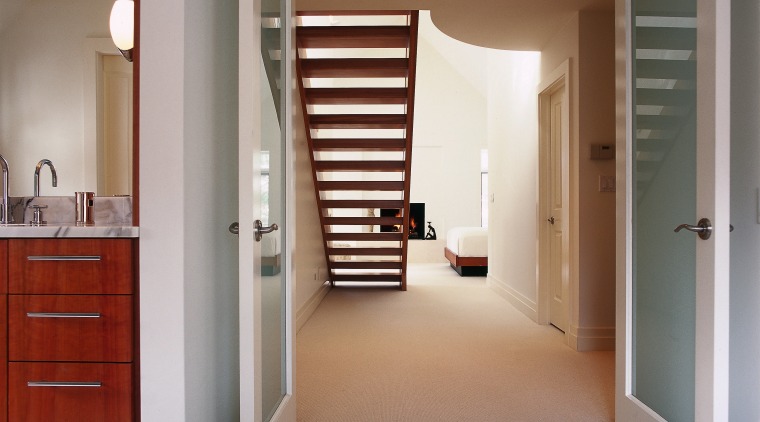 Open stairs allow an uninterrupted view between bedroom door, floor, flooring, hardwood, home, interior design, real estate, room, wall, window, wood, wood flooring, gray