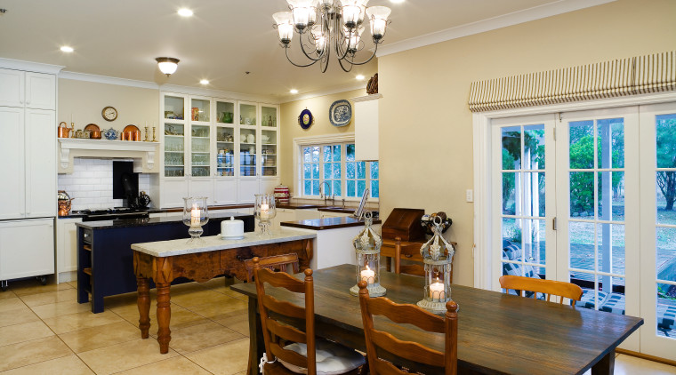 A view of the kitchen and dining areas, dining room, interior design, kitchen, property, real estate, room, table, gray
