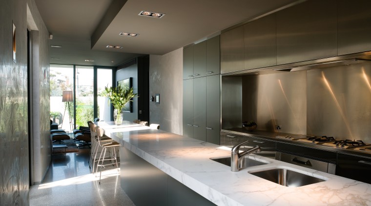 A view of this kitchen featuring polished concrete architecture, interior design, black, gray