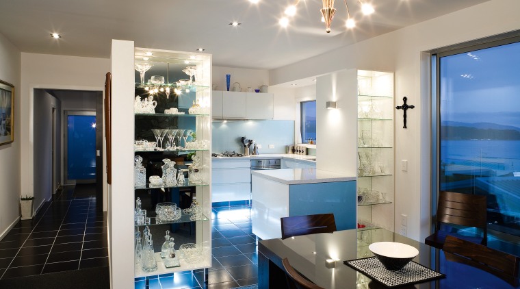 A view of this kitchen featuring tiled flooring, interior design, kitchen, real estate, room, gray