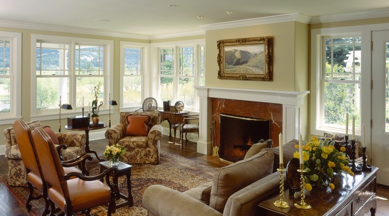 An interior view of the living space featuring ceiling, estate, home, house, interior design, living room, property, real estate, room, window, gray, brown