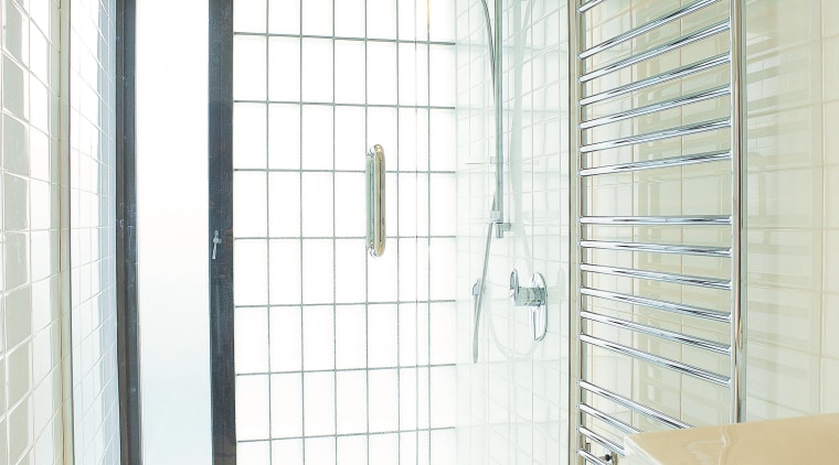 A view of a glass shower enclosure by bathroom, curtain, door, glass, interior design, plumbing fixture, room, shower, tile, window, window covering, window treatment, white