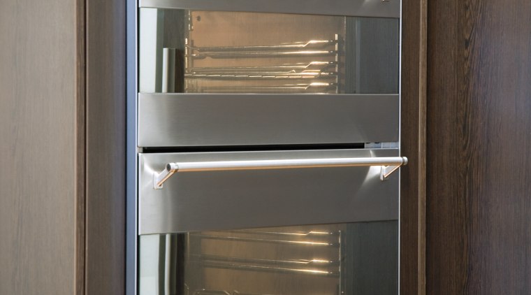 A view of the modern Smeg stainless steel gas stove, home appliance, kitchen appliance, kitchen stove, major appliance, microwave oven, oven, black, gray