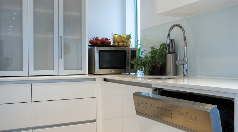 A view of this kitchen featuring the latest cabinetry, countertop, cuisine classique, home, home appliance, interior design, kitchen, room, gray