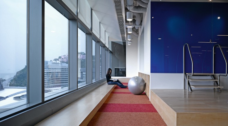 Along, slender reading area forms part of DDB's architecture, floor, flooring, interior design, office, product design, gray