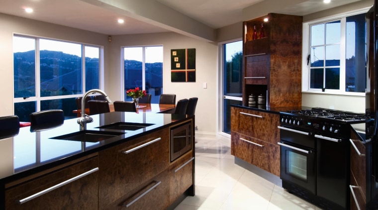 A view of this kitchen featuring blur elm cabinetry, countertop, cuisine classique, interior design, kitchen, real estate, room, brown, white