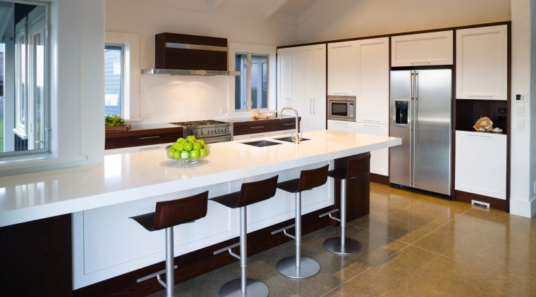 A view of this kitchen featuring laminex caeserstone cabinetry, countertop, cuisine classique, interior design, kitchen, real estate, room, gray