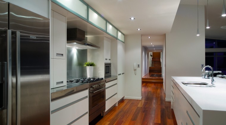 A view of this kitchen featuring polished timber cabinetry, ceiling, countertop, interior design, kitchen, real estate, room, gray