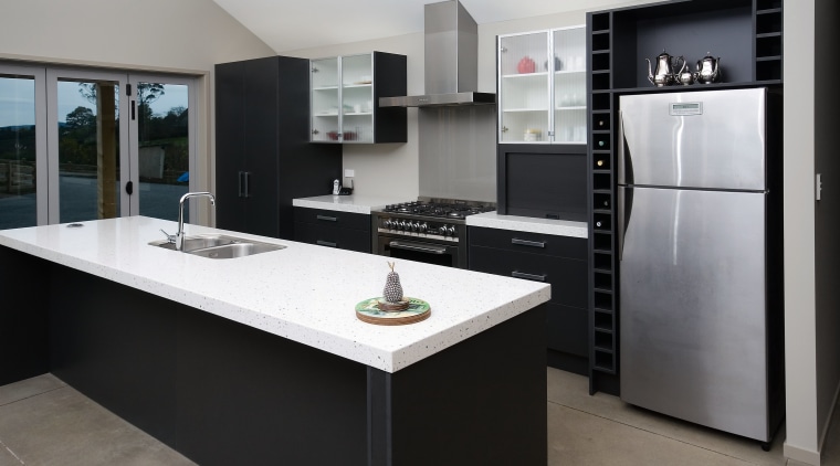 A view of this custom kitchen designed and cabinetry, countertop, cuisine classique, home appliance, interior design, kitchen, room, black, gray