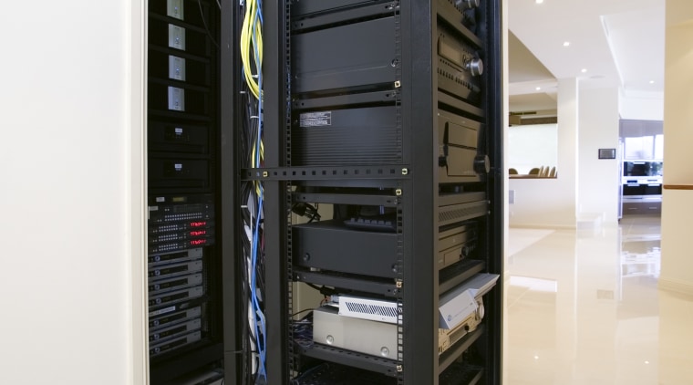 Equipment racks, built on a floor railing system, technology, white, black